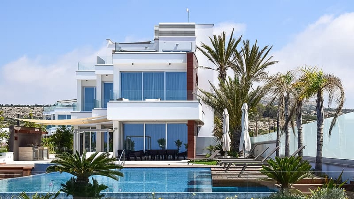 Modern Poolside Paradise with Royal Palms